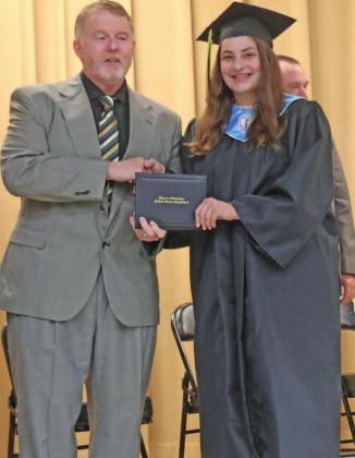 MO graduationJoanna Orner recieves diploma from Superintendent Rodney Vollmer