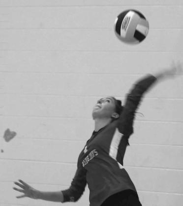 Guthrie Volleyball Cora Leach serving the ball against OBA on October 3.