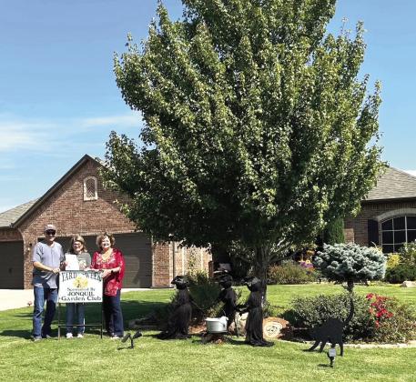 Guthrie Jonquil Garden Club is pleased to announce Yard of the Week honoring Jack &amp; Sandy Clendenny, 12446 Blue Meadow. Pictured L to R: Jack, Sandy &amp; Dana Bertrand, Garden Club member.