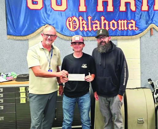 Guthrie Band Director- Rob Blackburn, with band student Tucker Tennill &amp; Bike Night organizer, Ryan Tennill. Photo courtesy of Amber Moore