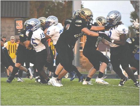 Coyle’s Alex Jennings looks to gain some yards in the Yale game.