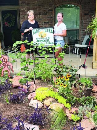 The Jonquil Garden Club is honoring the home of Candy O’Neal, 415 Redbud Lane in Timberland Hills as Yard of the Week. Pictured left to right is Pam Williams, Club Representative and Candy, homeowner.