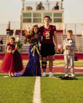 Cashion High School’s 2025-2026 Homecoming Queen Azlynn Thomas and Homecoming King Drew Westerhoff are pictured with Flower Girl Eleanor Edgeman and Crown Bearer Ridge Nichols. Photo by Rylee Broadbent