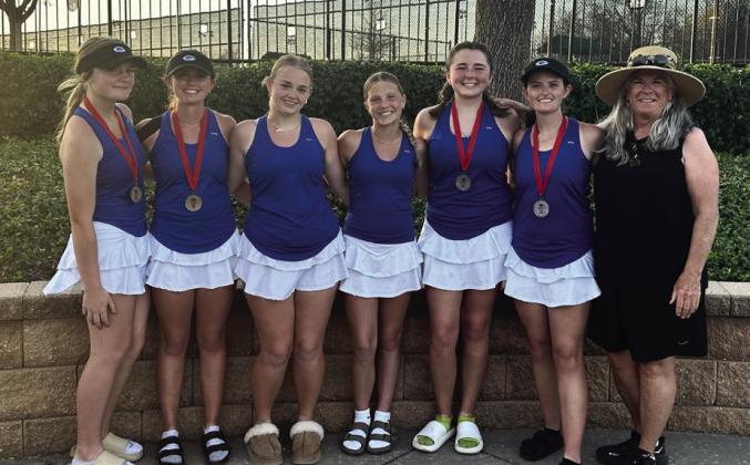 L-R Haven Hudson and Hollie Mitchell placed 5th at 2 doubles, Kenzie Hardesty placed 6th at 2 singles, Lola Brown placed 6th at 1 singles, Rylee Tobin and Aspen Mitchell placed 2nd at 1 doubles, Coach Mary Hudson during the Duncan tourament. Submitted photo