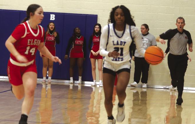 Guthrie Girls BB- Ania Morgan runs fastbreak against Elgin.