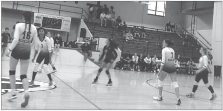 Pictured at right, Guthrie varsity volleyball in action against Destiny Christian School on September 16. The Lady Bluejays came from behind in the first set from a 16-19 deficit to win 25-20. In the second set, the visitors jumped out to an 8-0 lead enroute to a 25-16 set win. The match would go four sets.