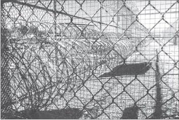 Davis Correctional Facility in Holdenville is one of two private prisons in Oklahoma. Situated just west of town, the medium security men’s prison can house up to 1,670 inmates. (Whitney Bryen/Oklahoma Watch)