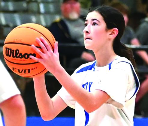 GJHS 7th Grader Jaydin Alexander at free throw line against Noble on December 8.