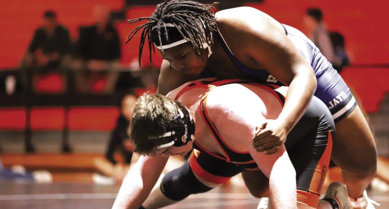 Guthrie's Sir William Morgan wrestles against Cushing on Tuesday, Jan. 28. Courtesy of Nicole Hall, Guthrie Wrestling (Facebook).