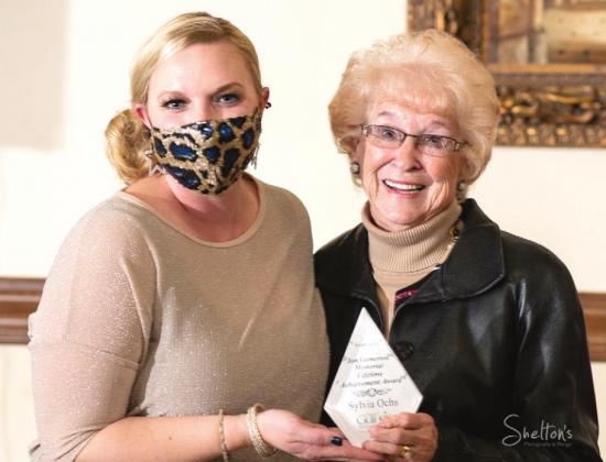 Brittany Timmons Chamber President and CEO with Sylvia Ochs John Gummerson Memorial Lifetime Award