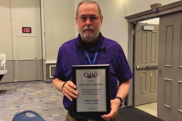 Alsup wins City Management Award for Outstanding Municipal Government Experience at CMAO conference. Picture found on Alsup’s Facebook account