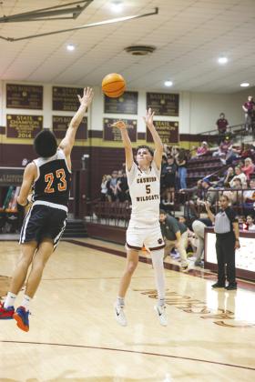 Kyle Yowell elevates for a jumper during Cashion’s senior night game.