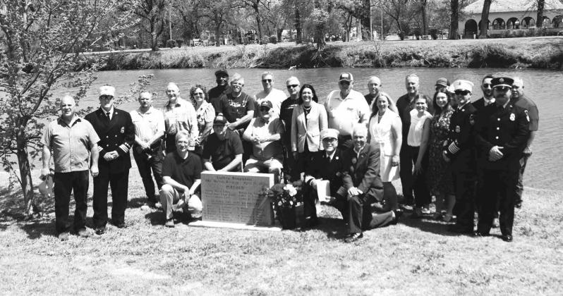 Public officials, victims' families, and firefighters gathered last Thursday at Mineral Wells Park to memorialize the newly unveiled monument honoring those lost. Photo courtesy of City of Guthrie.