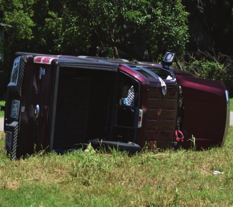 Nobody is injured after the car flipped. (Image by Brett Tennyson)