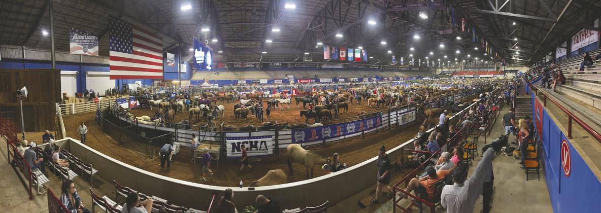 Contestants, families and their horses gather inside the Lazy E Arena in Guthrie, Okla., during an overnight severe weather evacuation at the National Junior High Finals Rodeo. Arena officials opened the facility as a shelter while participants moved livestock to safety and waited out the heavy winds Tuesday morning. The emergency response drew praise from competitors, parents and local emergency management officials. Photo courtesy of the Lazy E Arena.