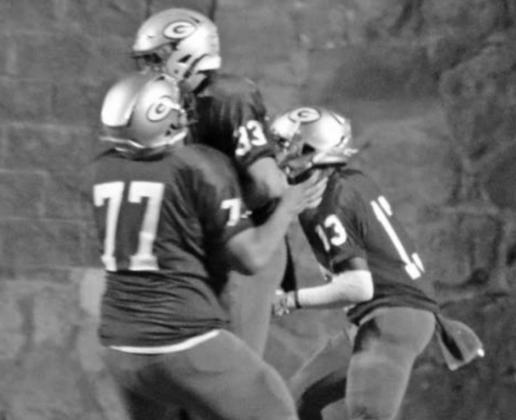 Carson Wilder celebrates touchdown with teammates