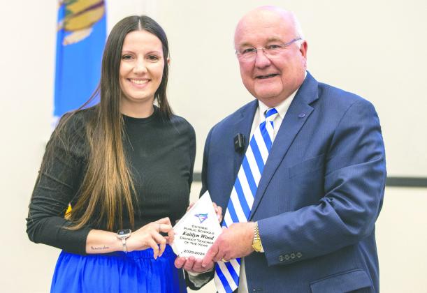 Kaitlyn Wood is recognized as the 2026 District Teacher of the Year for Guthrie Public Schools alongside Superintendent Dr. Mike Simpson during the district’s Teacher of the Year celebration held Feb. 23 at Meridian Technology Center. Photo by Brent Fuchs