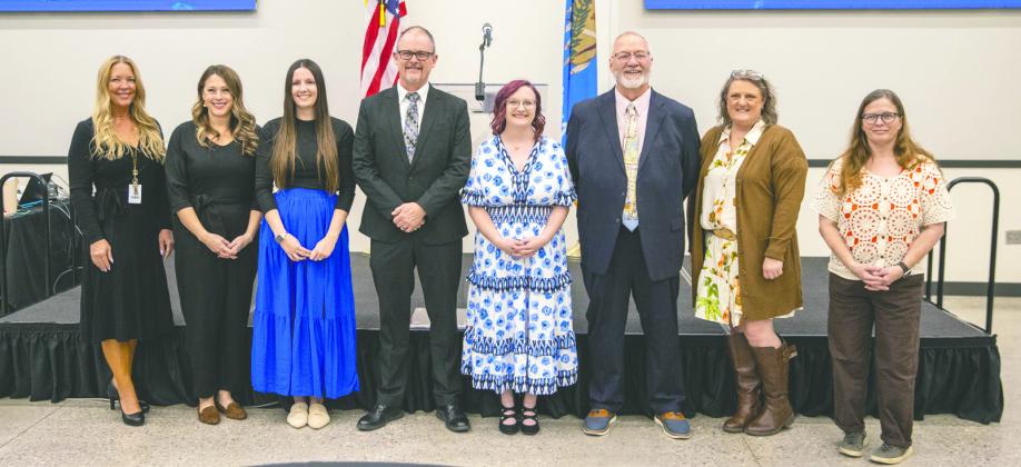 Site Teachers of the Year from Guthrie Public Schools are pictured during the district’s Teacher of the Year celebration at Meridian Technology Center. From left: Crystal Carnes, Dana Black, Kaitlyn Wood, Rob Blackburn, Desiree Dehnhardt, Bill Perring, Fonda Hefner and Donna Simpson. Photo by Brent Fuchs