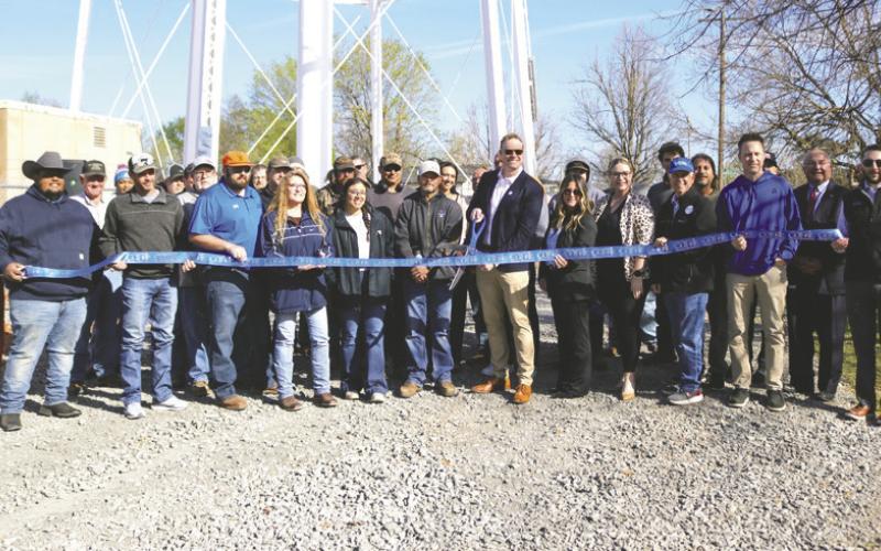 Guthrie community members and officials marked the completion of a new booster pump station at a ribbon cutting ceremony on March 23.