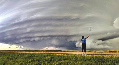 Windsonde launch near Norman, Okla. Windsondes are small weather balloons with attached instrumentation that can be launched every _ #8211;_ 2seconds from a field vehicle, allowing researchers to have many of them in the air at once. (Photo by Christiaan Patterson/OU CIMMS/ NOAANSSL) (NOAA)