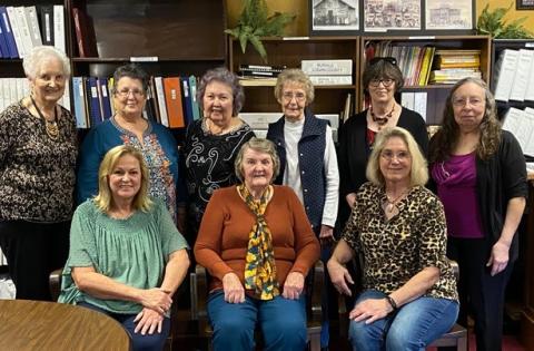 The people in the attached photo are, from left to right, front row: Debbie Longnecker, Sharon Garrett, Linda Pruitt; back row: Nelda Brown, Diane Garrett, Nancy Davison, Yvonne Harris, Linda Rainey (current President), and Brenda McCormack. Not pictured, but attending via Zoom, were Denise Orr and Brian Elston.