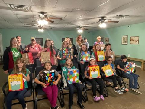 Girl Scout Troop 3005 donates 15 birthday bags to Hands of Jesus  in Guthrie. Birthday bags consist of cake mixes, icing, Birthday decorations and a small gift to brighten a Birthday child's day that might not be able to celebrate.