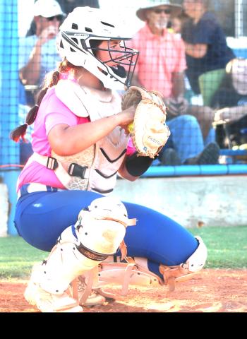 Abbie Eichler warms up for the Enid game.