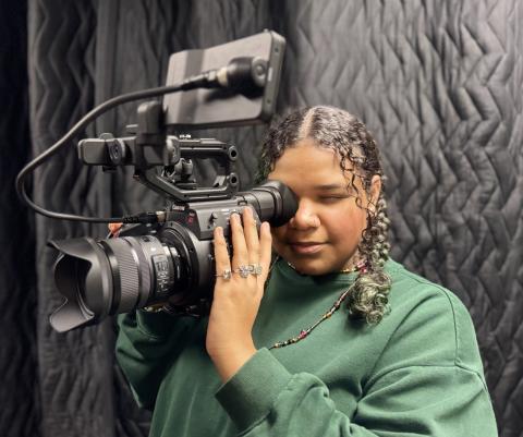 Guthrie High School Junior Jameelah Ramirez explores her creativity behind the camera, filming with professional video equipment in Meridian’s Digital Media program.