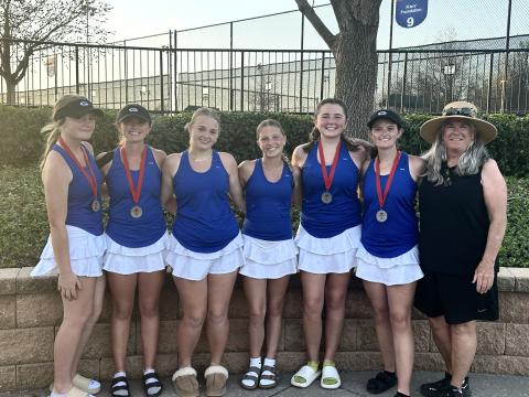 L-R Haven Hudson and Hollie Mitchell placed 5th at 2 doubles, Kenzie Hardesty placed 6th at 2 singles, Lola Brown placed 6th at 1 singles, Rylee Tobin and Aspen Mitchell placed 2nd at 1 doubles, Coach Mary Hudson during the Duncan West tournament. Submitted photo