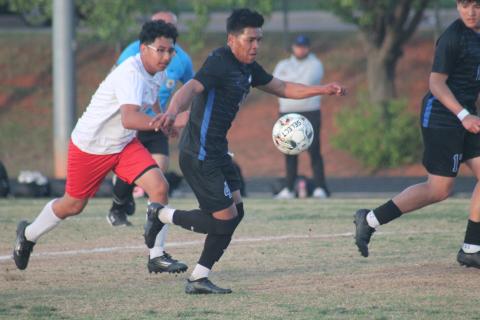 Guthrie's Alejandro Sanchez attempts to control the ball against Del City, Monday, March 31. Taken by George McCormick.