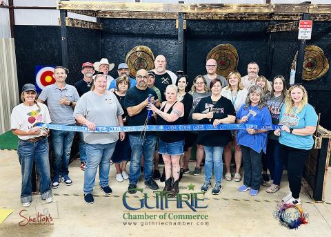Ribbon Cutting at Dueling Axes. Photo submitted by Heath Shelton of Shelton's Photography