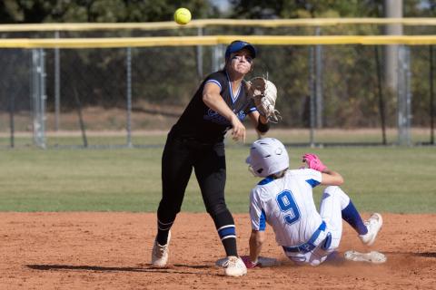 Guthrie High Junior softball player Savannah Ingle, who homered in the Lady Jay's season-ending 18-8 loss to Pryor, completes the throw to first base. See more photos in our photo gallery.  