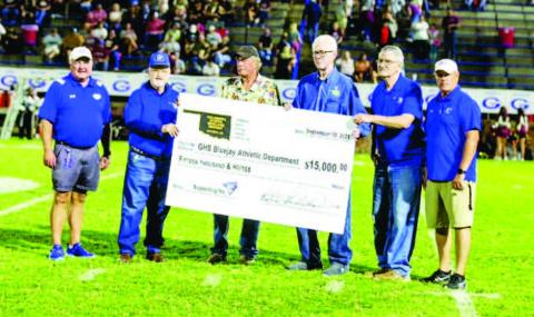 Left to right Mike Simpson – GPS Superintendent, Richard Hendrix, Hugh Plagg, Jack Haron, Alan Penner, John Chappell- Athletic director. Photo by Brent Fuchs