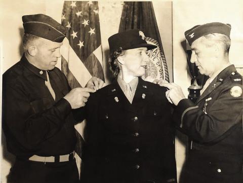 Helen Freudenberge Holmes being promoted in 1942.