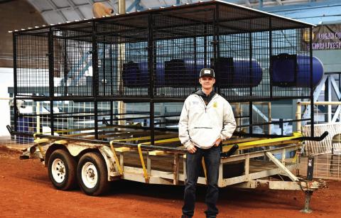 Congratulations to Chapter Secretary Regan Price with Coyle FFA on winning Reserve Division Champion with the dog kennel he built. People who work in ag mechanics enhance farming technology and help farmers work more efficiently. They test machine systems, troubleshoot problems, perform repairs on machinery and maintain equipment to keep productivity high. Photo by Brett Tennyson