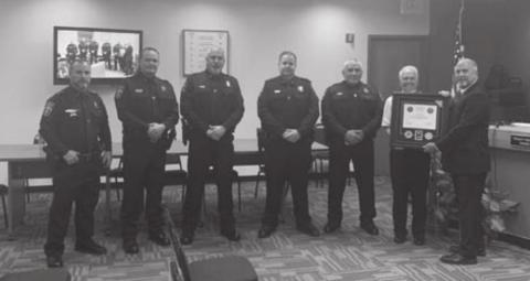 Guthrie Police Department receiving award at City Council meeting.