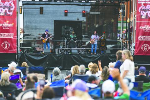 Jokers to the Right entertain the crowd during the inaugural Downtown Downbeat. Photo by Brent Fuchs.