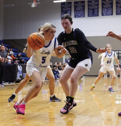 Coyle’s Lady Jackets make a run to the basket during the game against Mulhall-Orlando on Dec. 12. Photo by Brent Fuchs