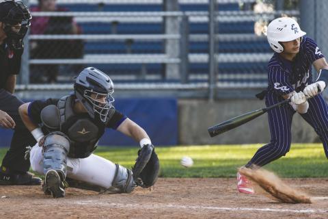 Guthrie senior Owen Wilder (21) fields a bouncing pitch at the plate during a 17–1 win over El Reno on Monday, April 20 at Squires Field in Guthrie. Photo by Brent Fuchs