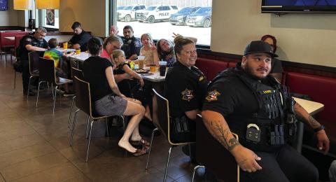 Pictured Above, Local Guthrie police officers and Logan County Sheriff’s deputies were at the local McDonalds last week for a meet and greet with customers. The event was held so that local residents could visit with the local law enforcement personnel in a neutral setting and ask questions. Photo by Trey Dallas