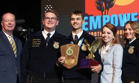Zachary Allen (center) of the Guthrie FFA Chapter accepts the FFA State Star in Agribusiness award at the 100th Oklahoma FFA Convention and Expo on May 6 at the BOK Center in Tulsa, Oklahoma. Congratulating Allen are Scott Nemecek (left), state FFA advisor; Heath Laubach, 20252026 Oklahoma FFA northwest area vice president; Jacey Fye, Oklahoma FFA Foundation executive director; and Darla Fesmire, 2025-2026 Oklahoma FFA reporter. Photo courtesy of the Oklahoma FFA Association