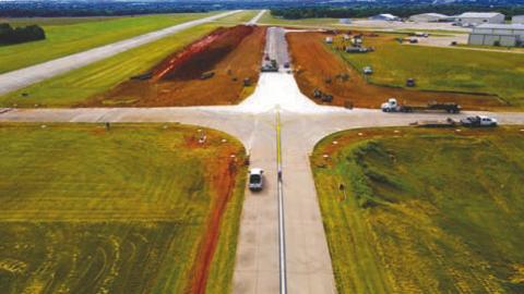 Aerial view of construction at a new taxiway intersection at the Guthrie-Edmond Regional Airport.