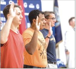 Guthrie High School students taking oath. Photo by Brent Fuchs
