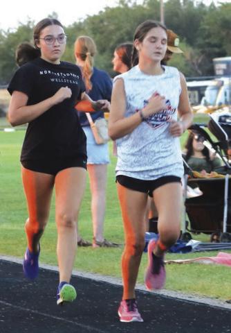 GHS Sophomore Taylor Schroder leads the way at Guthrie Mile Night.