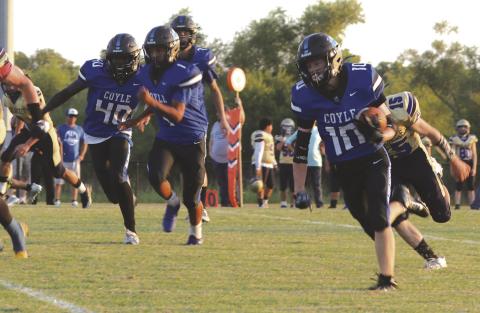 Coyle's Carson Hock on the way to one of his five touchdowns on September 13.