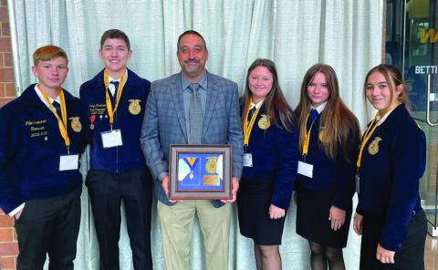 From left to right- Willie Schoonover, Kaylee Blagden, Casyn Larman, Hanna Schmidt, and Lora Golay attending the first general session at the Lucas Oil Stadium.