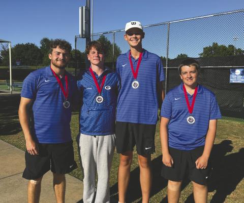 The Guthrie boys tennis team gathers after competing at the Class 5A State Championships, highlighted by a second-place finish from Carson Olmsted and Jaxson Mayer in No. 1 doubles and a fifth-place finish from Drake Shelton and Trenton Edberg in No. 2 doubles. Photo Submitted
