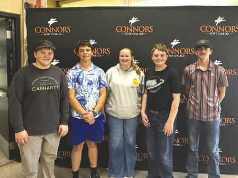 Mulhall-Orlando FFA members Jace Taylor, Fletch Inman, Wade Blagden and Daxton Pack pose with their awards after winning the Farm and Agribusiness Management contest at Aggie Day Interscholastics hosted by Connors State College on April 2. Photo courtesy of Mulhall-Orlando FFA
