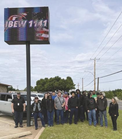 Students from the Guthrie Job Corps Center’s Hard Trades departments pose outside IBEW Local Union 1141 in Oklahoma City during an April 29 site visit, where they learned about apprenticeship opportunities and careers in the electrical trades. Photo courtesy of Guthrie Job Corp.