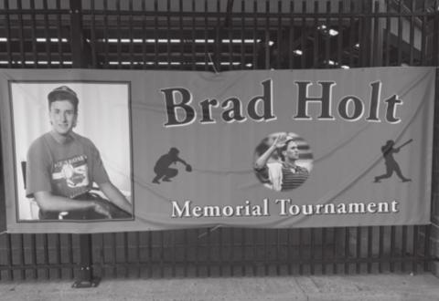 Brad Holt pictured on a banner outside Squires Field in Guthrie
